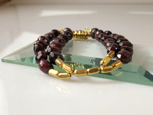 Load image into Gallery viewer, Garnet and Gold X-cross bracelet bykatejewelry in California.