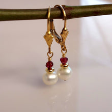 Load image into Gallery viewer, One inch, handcrafted, Garnet, Pearl and Gold stacked beads are hand wire-wrapped to 14 karat gold-filled lever back closures.