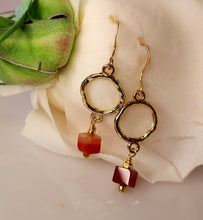 Load image into Gallery viewer, Carnelian and gold-plated round links and hand wire wrapped together and are suspended for m 14 karat gold filled ear wires.