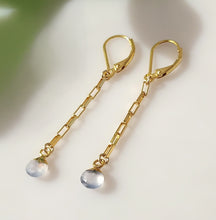 Load image into Gallery viewer, A pair of gold drop earrings with 14-karat Gold-filled findings, leverback closures, paperclip-style chain links, and small faceted, teardrop shaped, gold-leafed Calcedony gemstone dangles, photographed on a plain light background.