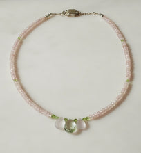 Load image into Gallery viewer, A delicate beaded necklace featuring light pink faceted Opal beads, small light green Peridot beads, and a central cluster of two Rose Quartz and one one Green amethyst teardrop beads, small light green accent beads, finished with a Sterling silver magnetic clasp.