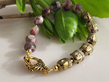 Load image into Gallery viewer, Buddah and Red Tourmaline 7 1/2 inch bracelet.
