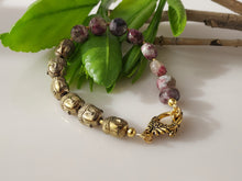 Load image into Gallery viewer, Red Tourmaline and Brass Buddah bracelet.
