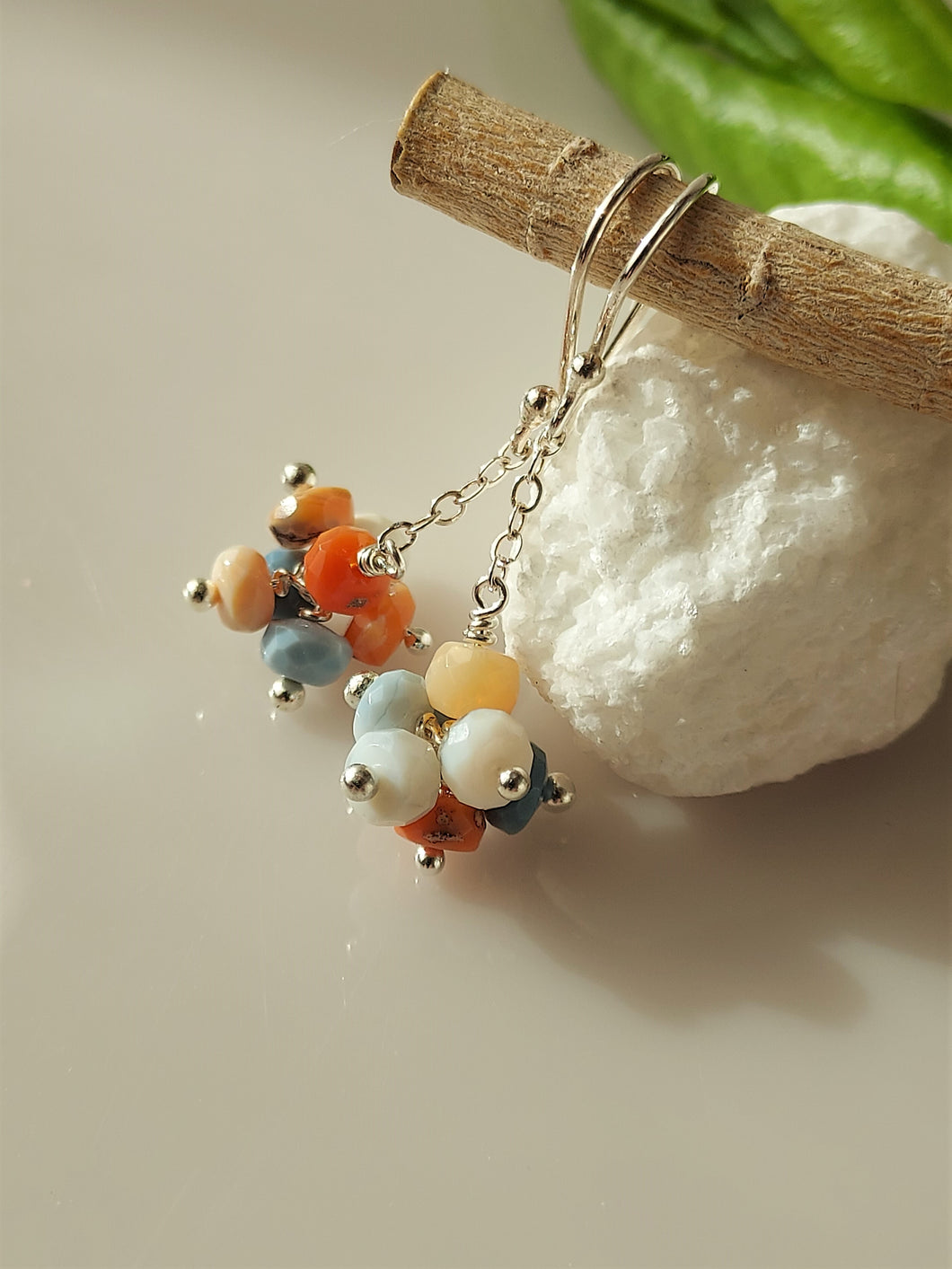 Multi colored Opal dangle earrings bykatejewelry in California.