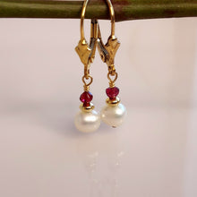 Load image into Gallery viewer, One inch, handcrafted, Garnet, Pearl and Gold stacked beads are hand wire-wrapped to 14 karat gold-filled lever back closures.
