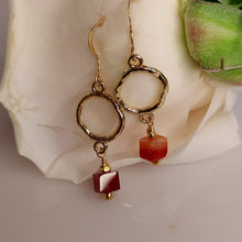 Load image into Gallery viewer, Carnelian and gold-plated round links and hand wire wrapped together and are suspended for m 14 karat gold filled ear wires.
