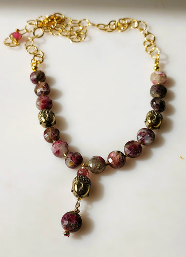Red tourmaline, Brass Buddahs and Gold necklace bykatejewelry.
