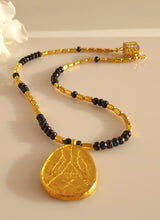 Load image into Gallery viewer, Gold and Sapphire necklace designed bykatejewely in California.
