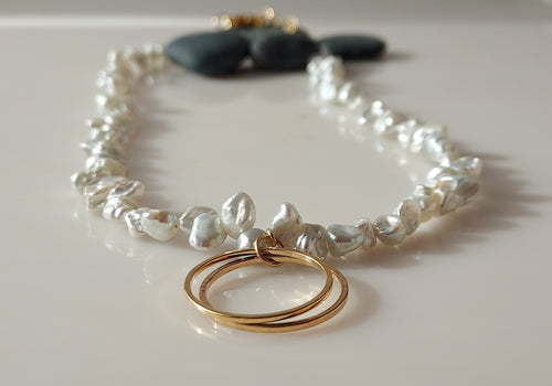 White Keshi Pearl and Gold hoop necklace.