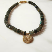 Load image into Gallery viewer, Labradorite beaded necklace featuring dark green, blue and gray labradorite stones with a 1handmade and kiln fired Bronze circular medallion pendant. 14 karat gold-filled toggle clasp.
